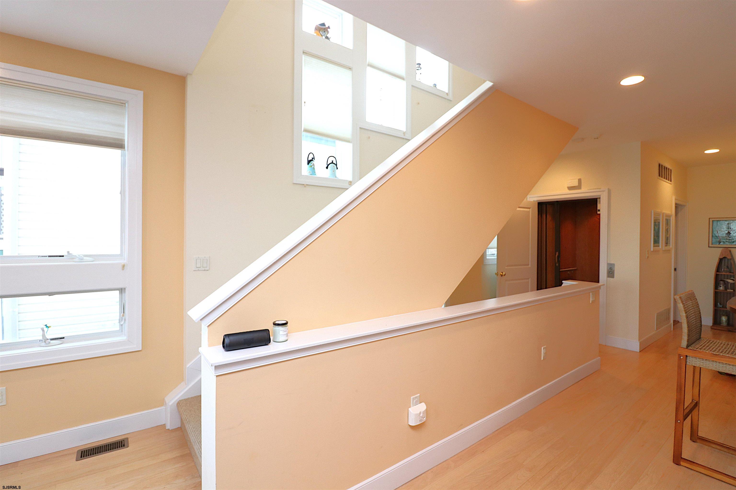 214 North Decatur Avenue, Unit B Margate City, NJ 08402 - Photo 2 of 23 a view of a hallway with furniture and a window