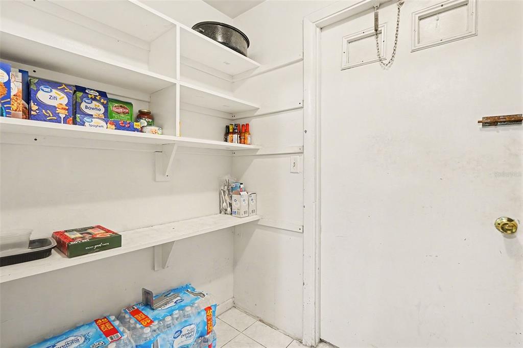 9528 River Road Spring Hill, FL 34608 - Photo 20 of 30 a view of storage and utility room with toys