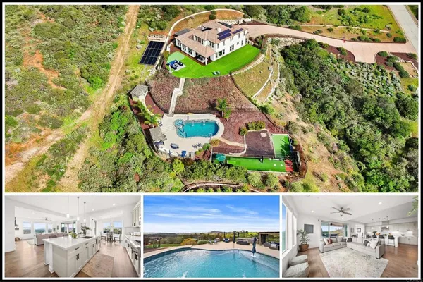 an aerial view of a house a yard and a fountain