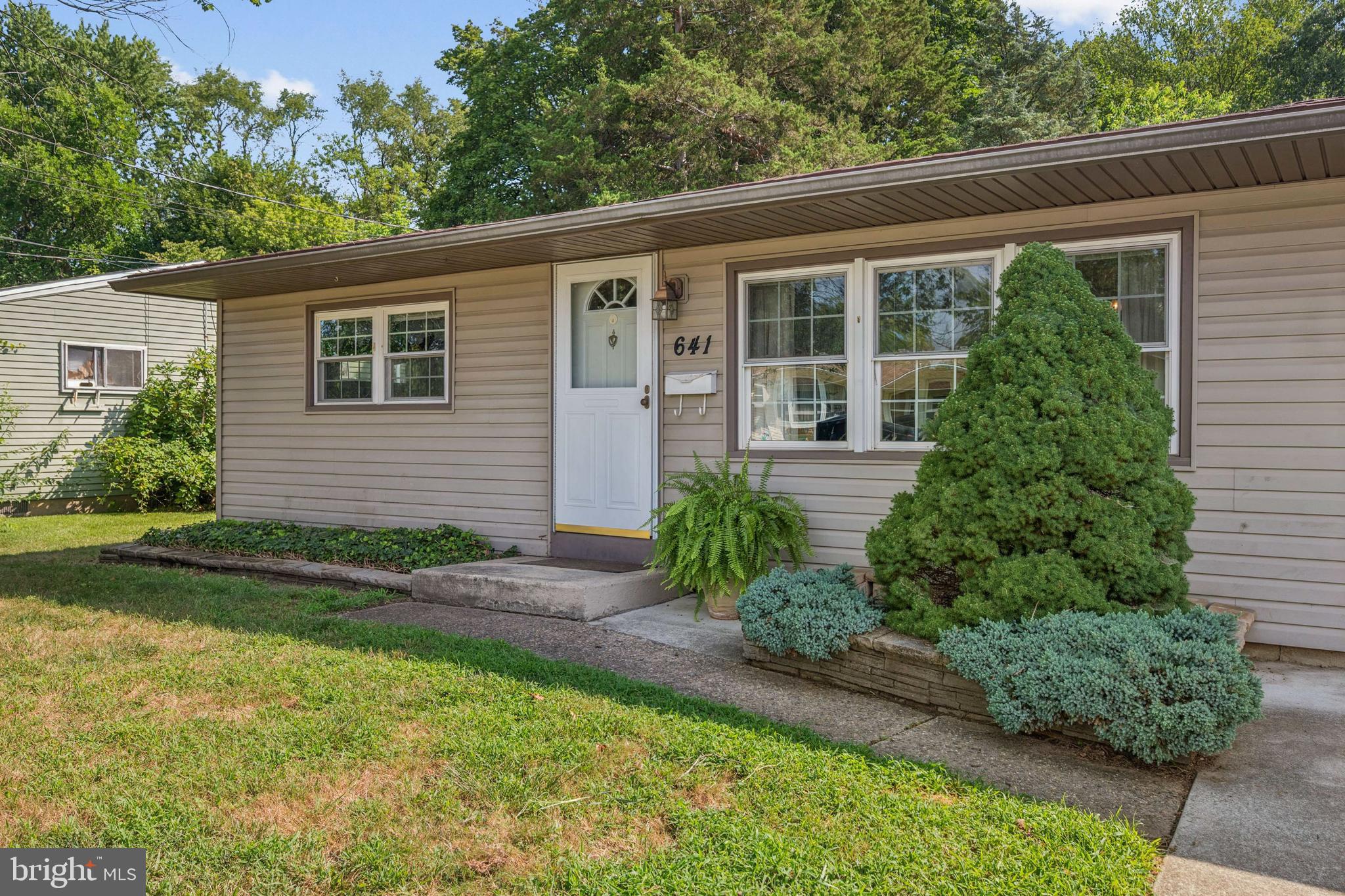 641 North Coles Avenue Maple Shade, NJ 08052 - Photo 1 of 23 front view of a house with a yard