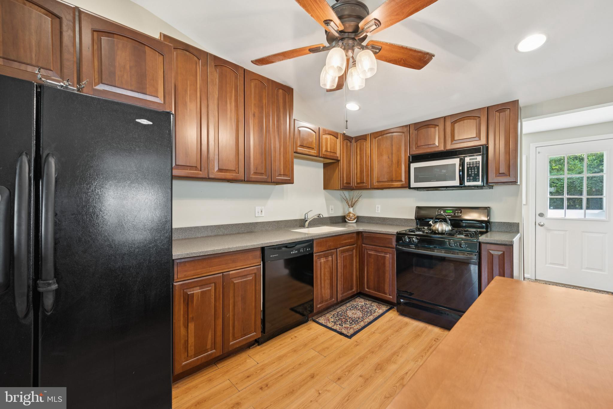 641 North Coles Avenue Maple Shade, NJ 08052 - Photo 2 of 23 a kitchen with stainless steel appliances granite countertop a stove refrigerator sink and cabinets