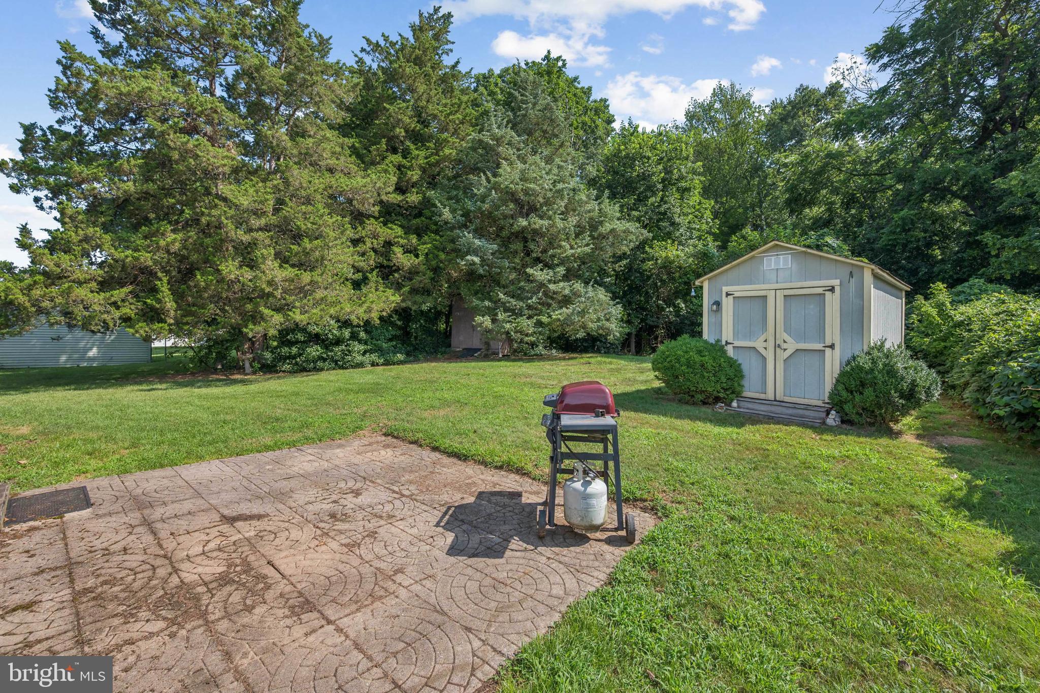 641 North Coles Avenue Maple Shade, NJ 08052 - Photo 21 of 23 a front view of a house with a yard and trees