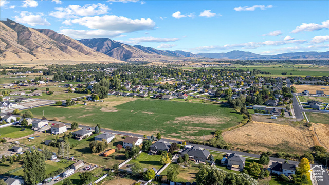 294 West 3400 South, Unit 9 Logan, UT 84321 - Photo 6 of 24 View of property location featuring nearby suburban area and a mountainous background