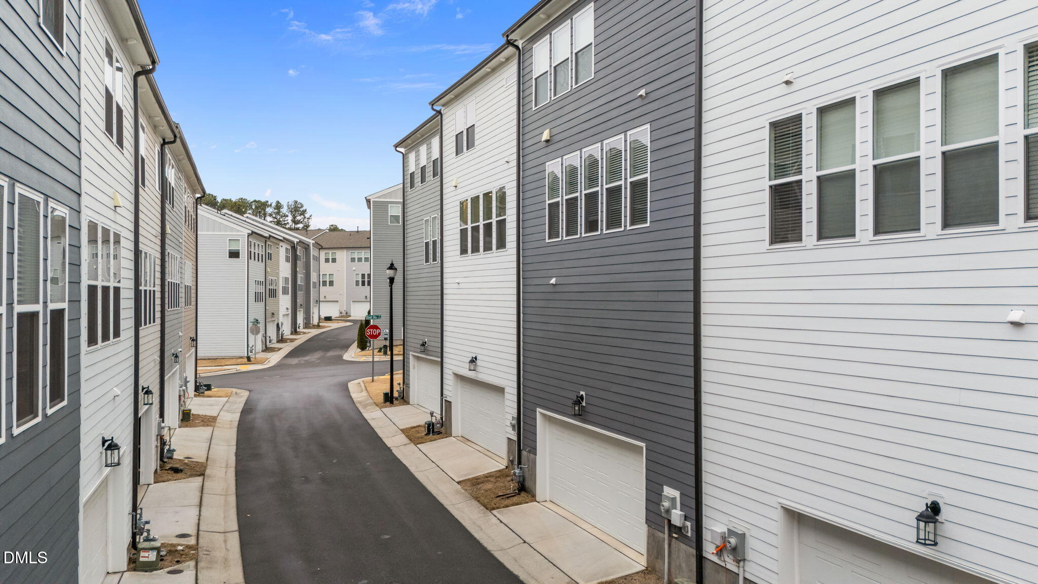 7015 Gentle Pine Place Raleigh, NC 27613 - Photo 33 of 41 a view of a patio with couches chairs and potted plants