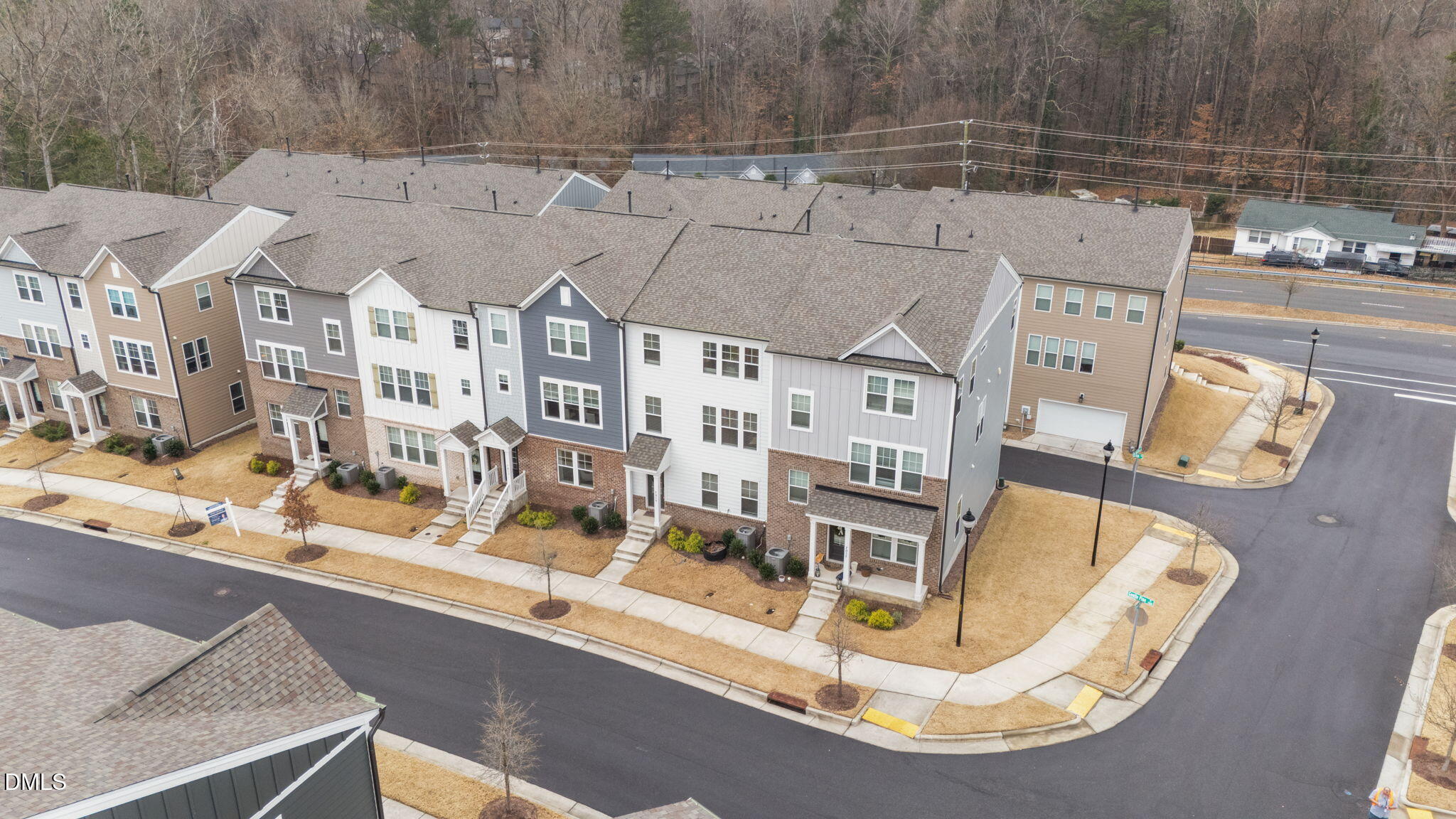 7015 Gentle Pine Place Raleigh, NC 27613 - Photo 39 of 41 a view of roof house with outdoor seating