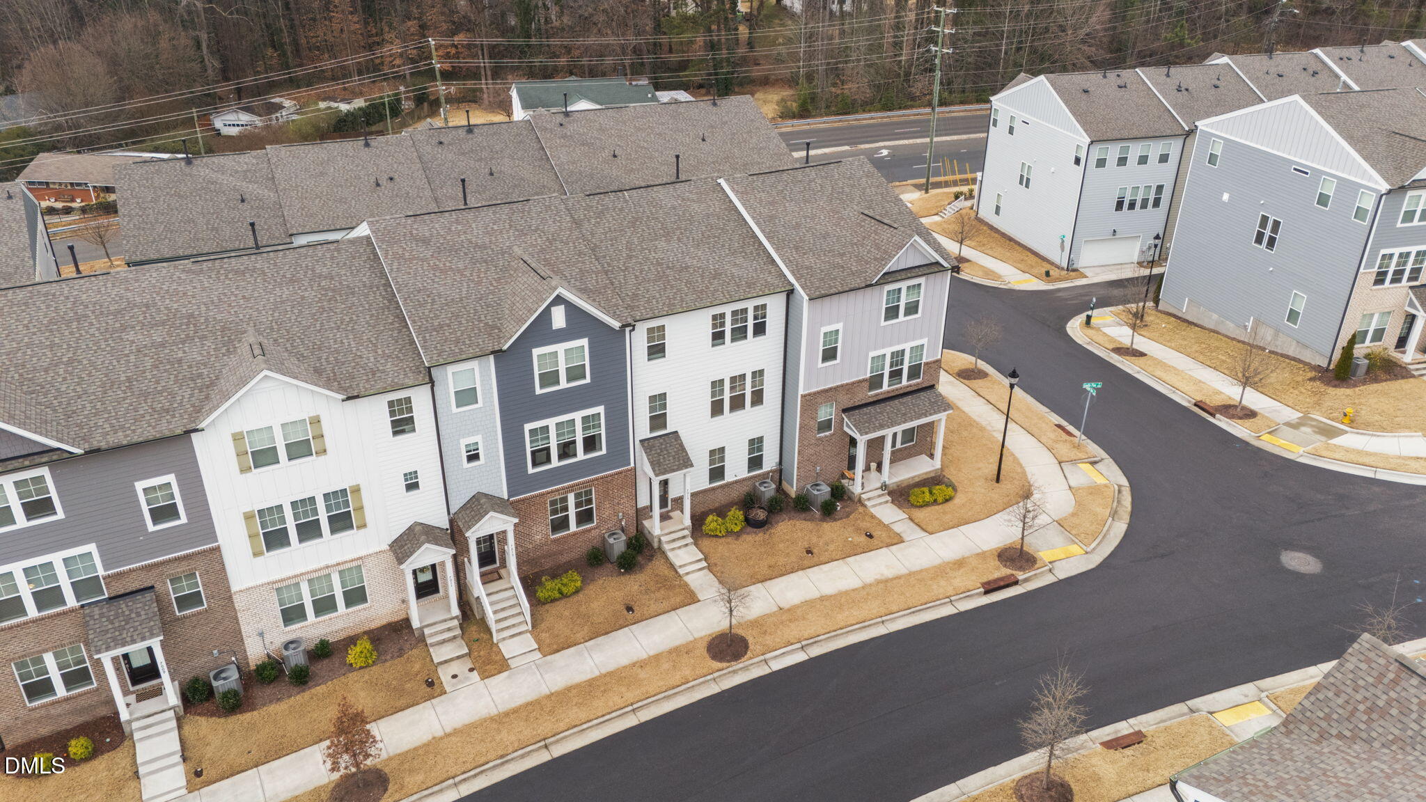 7015 Gentle Pine Place Raleigh, NC 27613 - Photo 40 of 41 an aerial view of residential houses with outdoor space