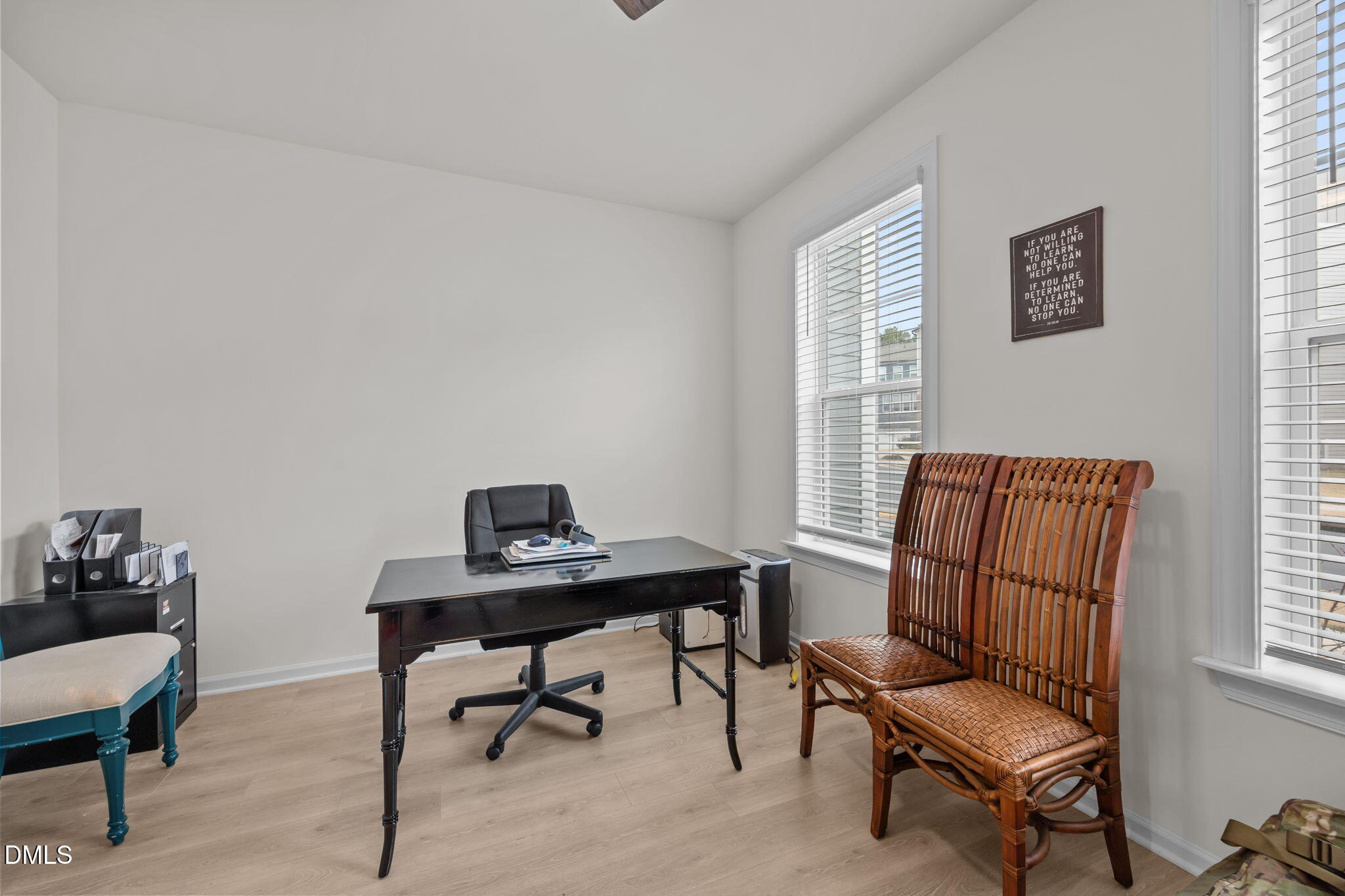 7015 Gentle Pine Place Raleigh, NC 27613 - Photo 7 of 41 a view of a workspace with furniture and a window