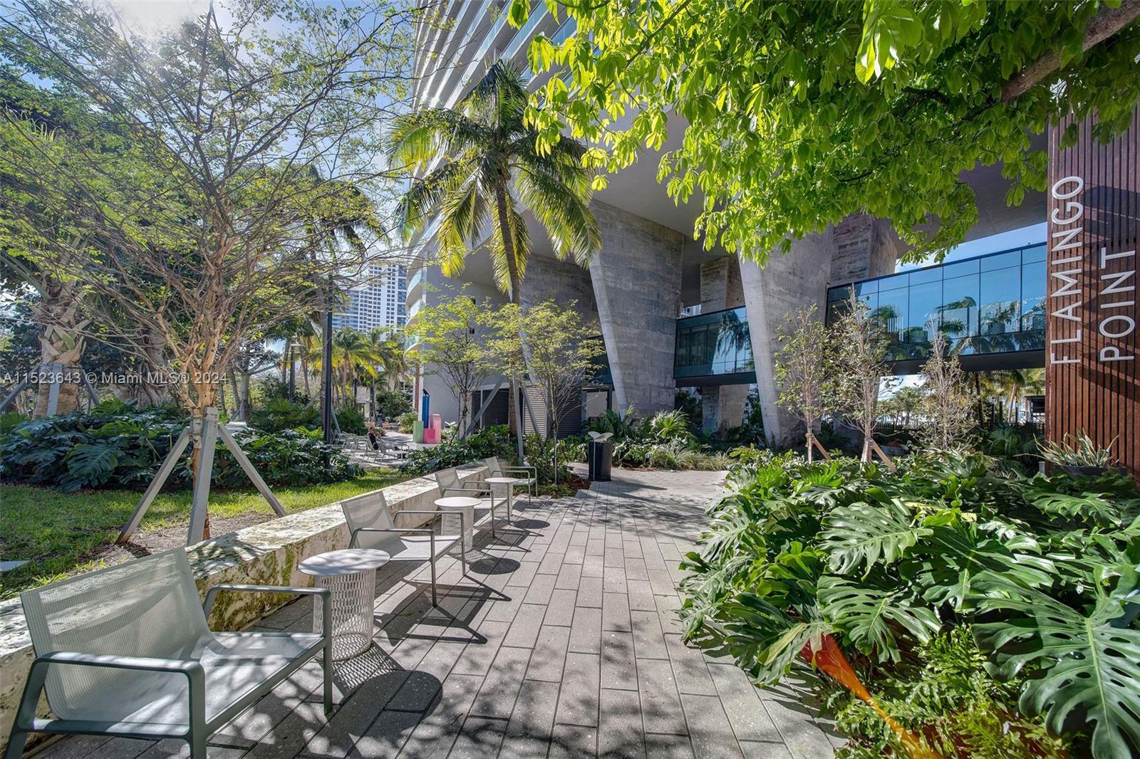 1500 Bay Road, Unit S0354 Miami Beach, FL 33139 - Photo 36 of 78 a view of patio with table and chairs and potted plants