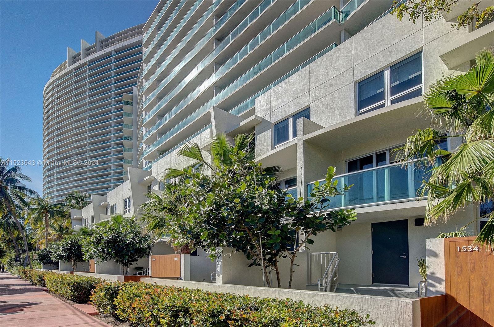 1500 Bay Road, Unit S0354 Miami Beach, FL 33139 - Photo 42 of 78 a front view of a house with plants