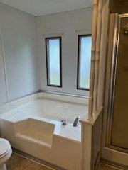 90 Willow Tree Drive Attleboro, MA 02703 - Photo 13 of 16 a bathroom with a bathtub and a sink