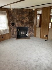 90 Willow Tree Drive Attleboro, MA 02703 - Photo 8 of 16 a view of a room with wooden floor and fireplace