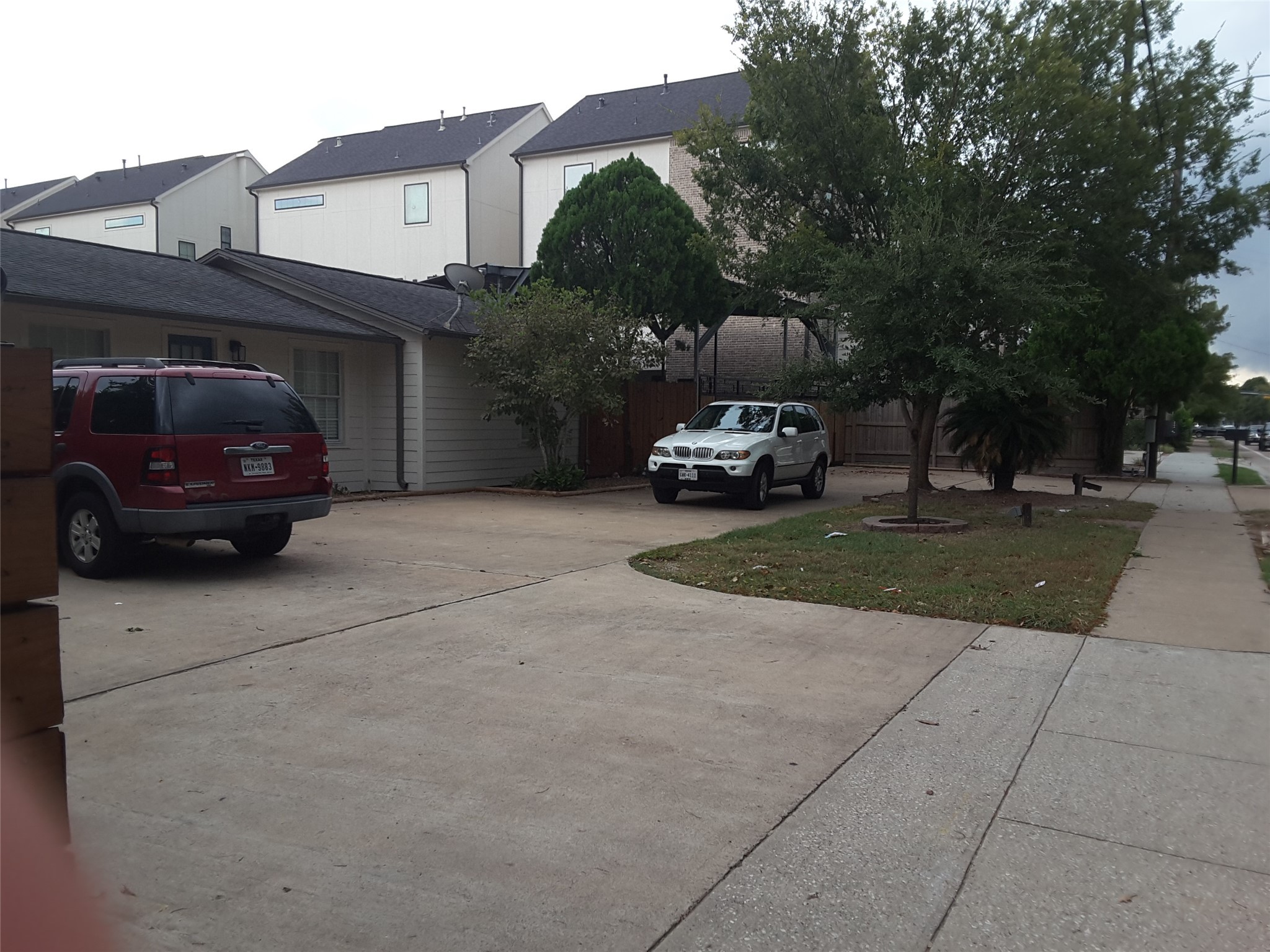 2132 Blalock Road Houston, TX 77080 - Photo 6 of 6 a car parked in front of a house