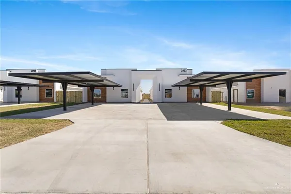 front view of a house with a swimming pool
