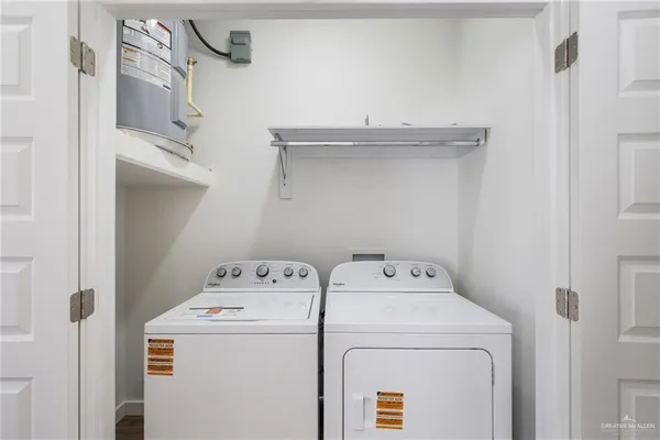 a utility room with dryer and washer