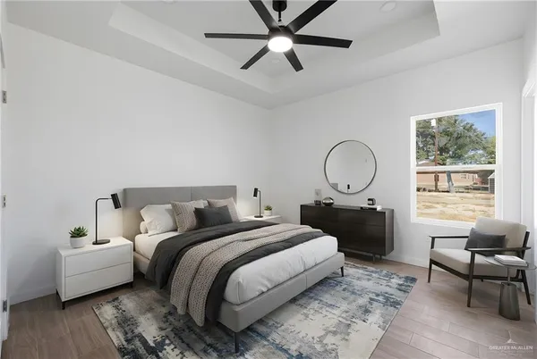 a bedroom with bed and a window