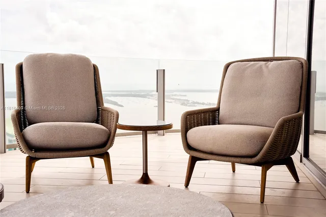 a room with furniture and a chair