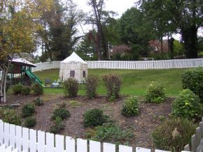 Landscaped fenced yard
