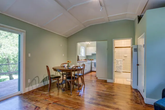 a view of a field with an ocean