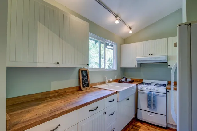 a view of road with green space