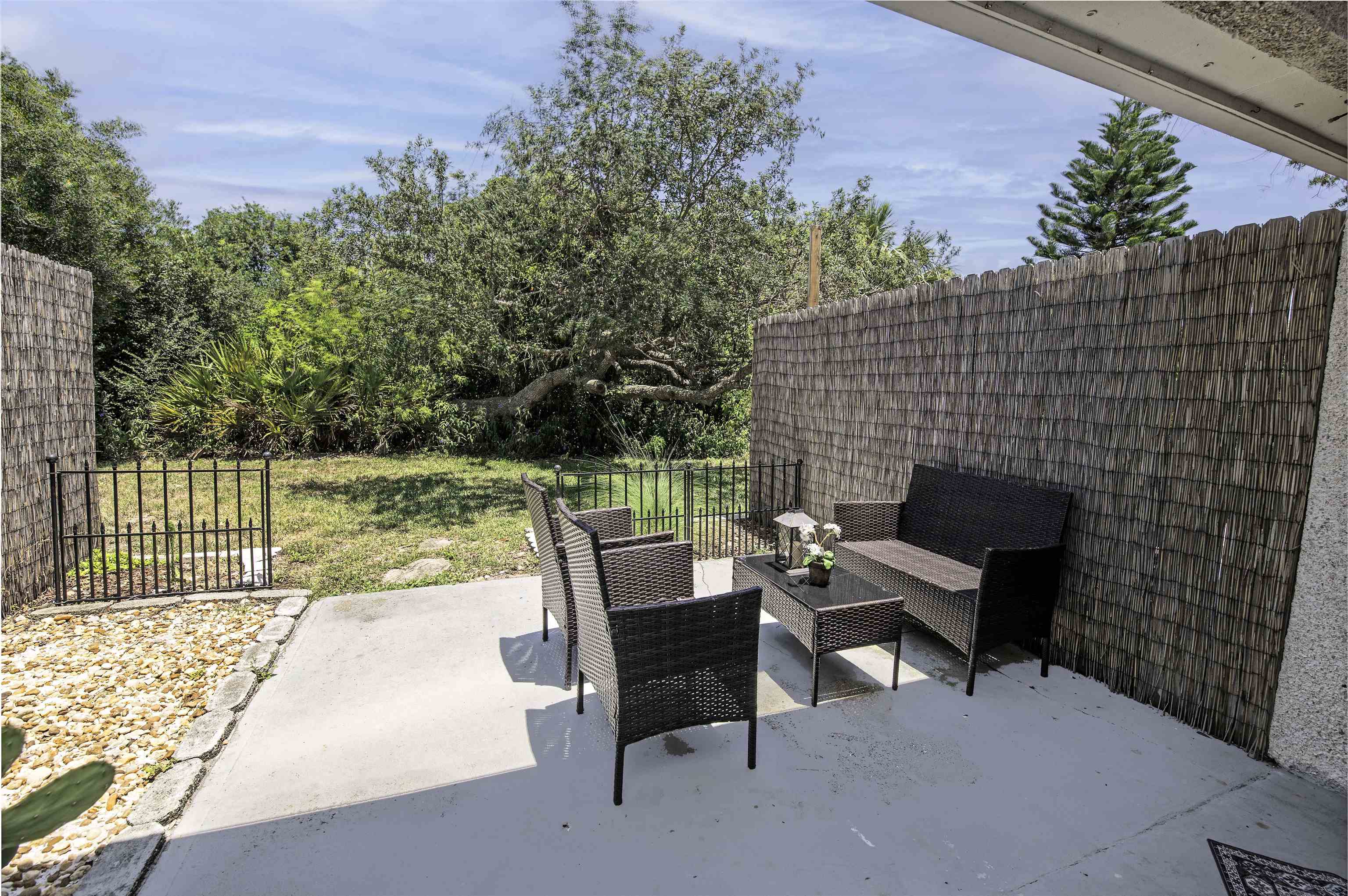 6452 Madison Street St. Augustine, FL 32080 - Photo 12 of 27 a roof deck view with a garden