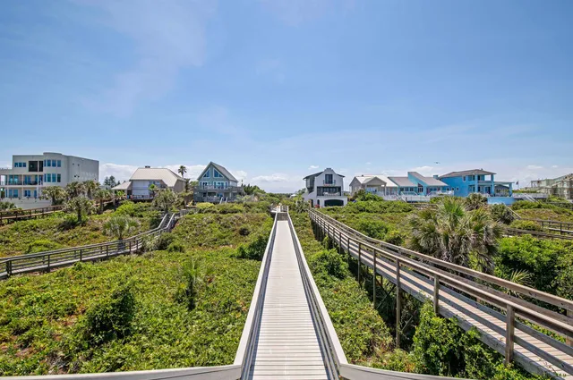 a view of balcony with yard