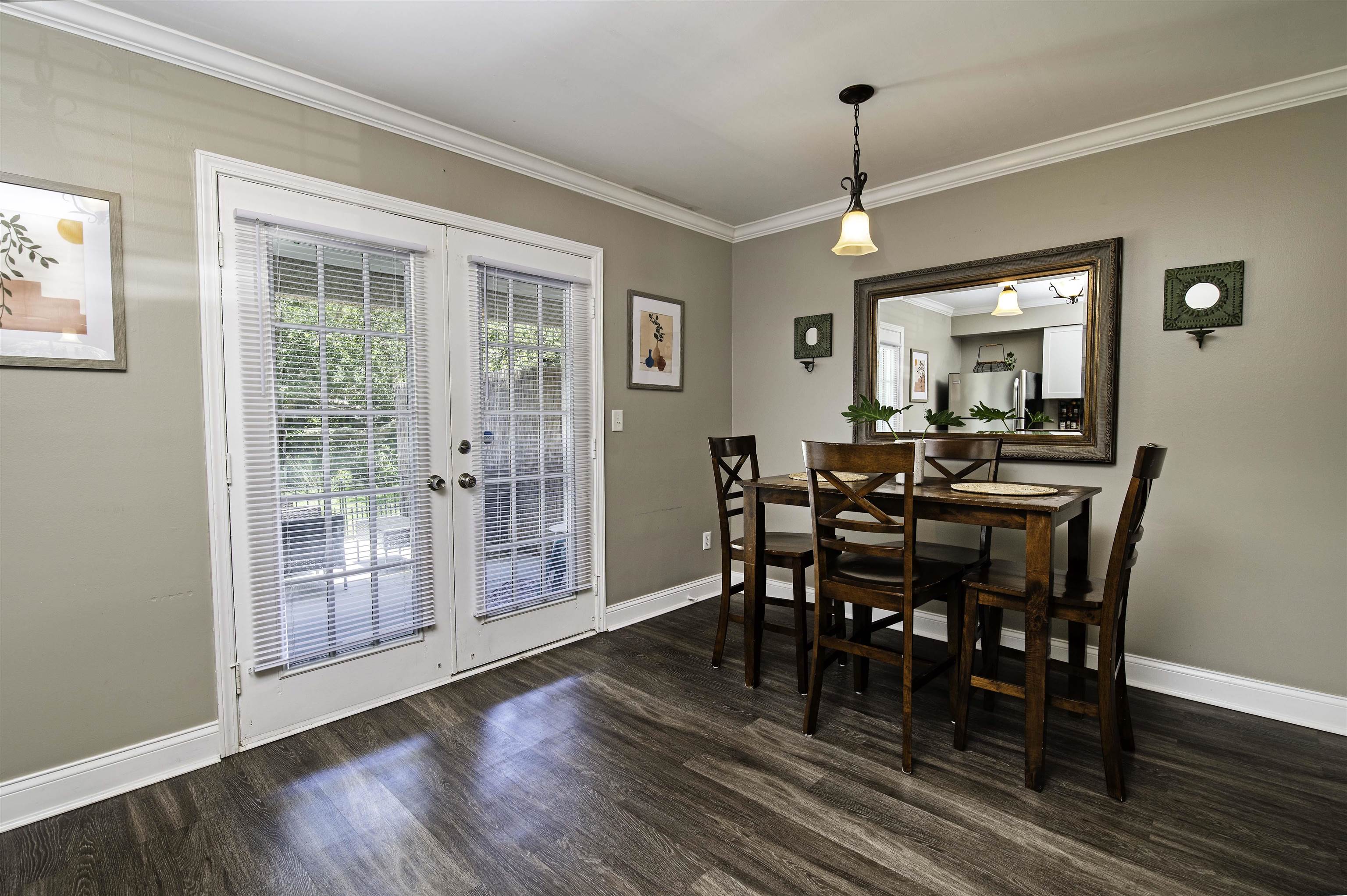 6452 Madison Street St. Augustine, FL 32080 - Photo 10 of 27 a view of a dining room with furniture window and wooden floor