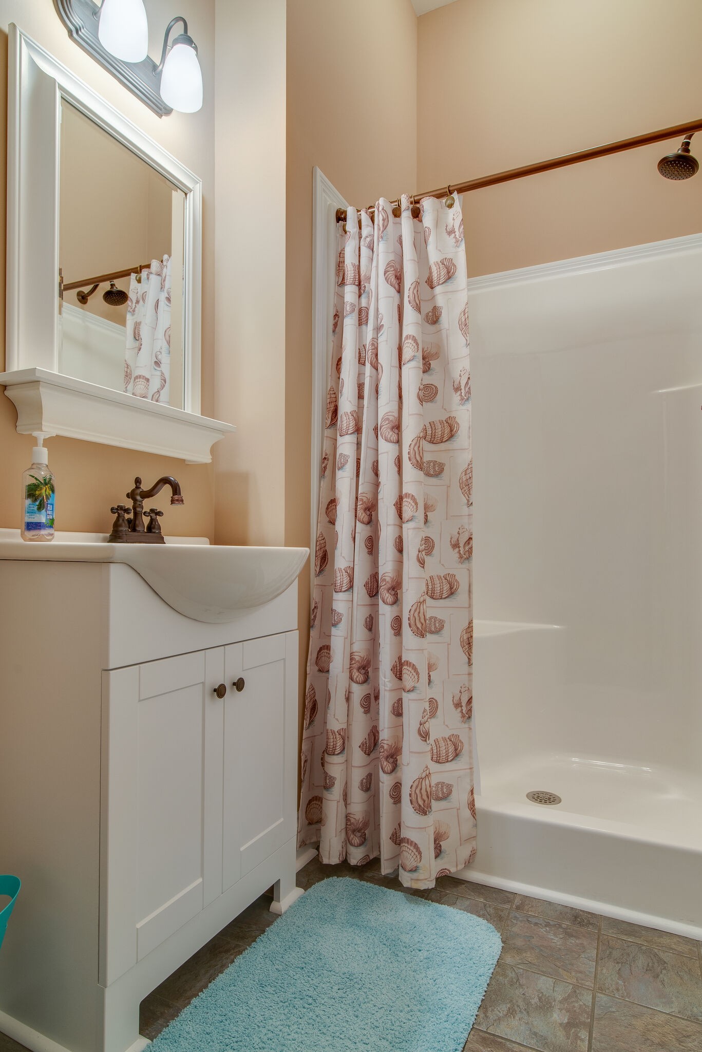 2741 Burgess Gower Road Springfield, TN 37172 - Photo 38 of 50 a bathroom with a sink a mirror a bathtub and shower