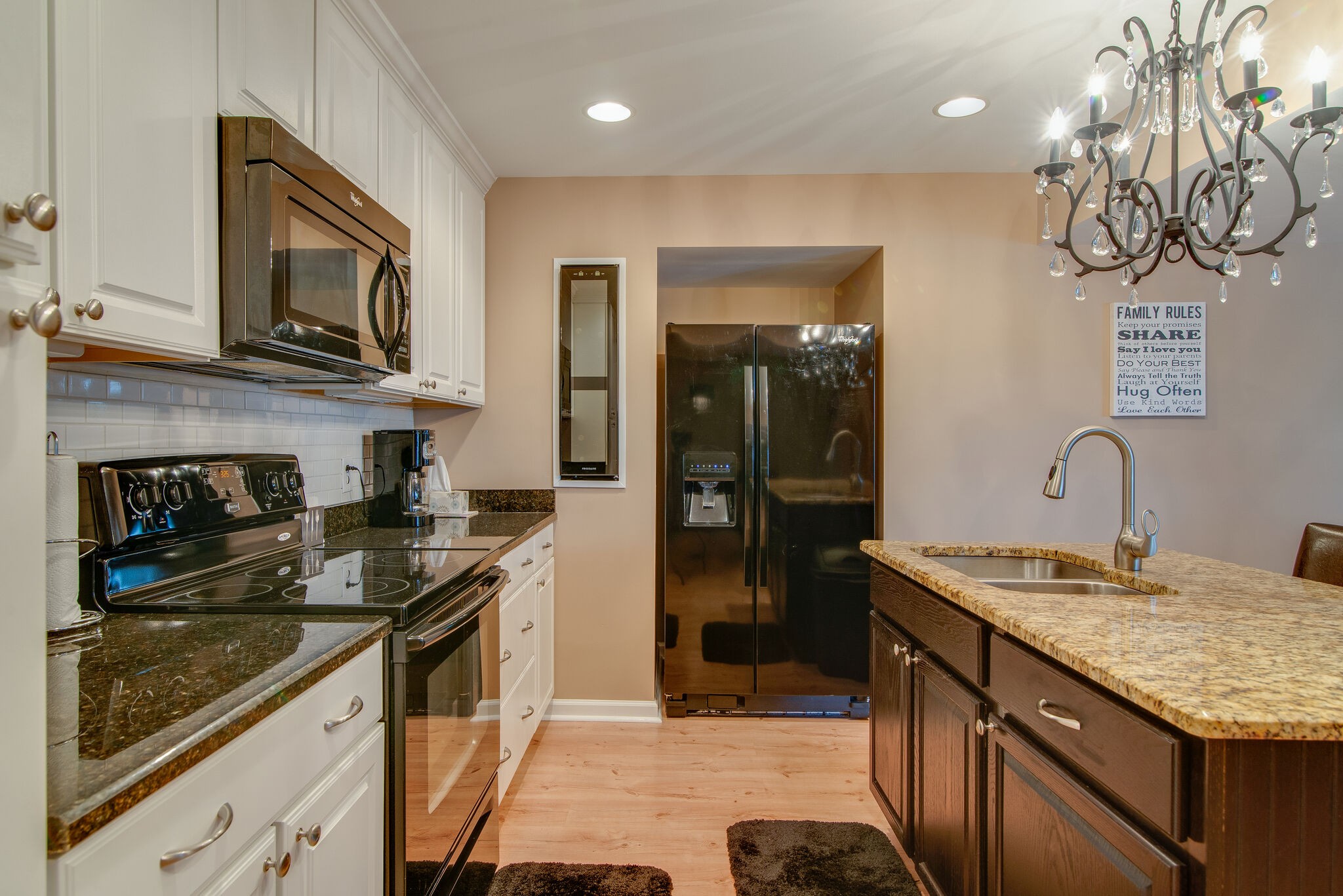 2741 Burgess Gower Road Springfield, TN 37172 - Photo 41 of 50 a kitchen with stainless steel appliances granite countertop a sink stove and refrigerator
