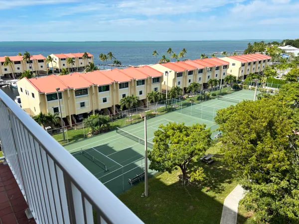 a view of balcony with furniture