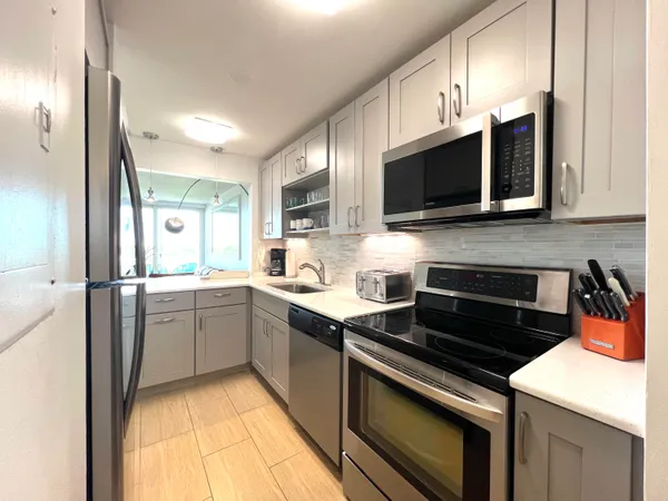 a room with furniture and a window