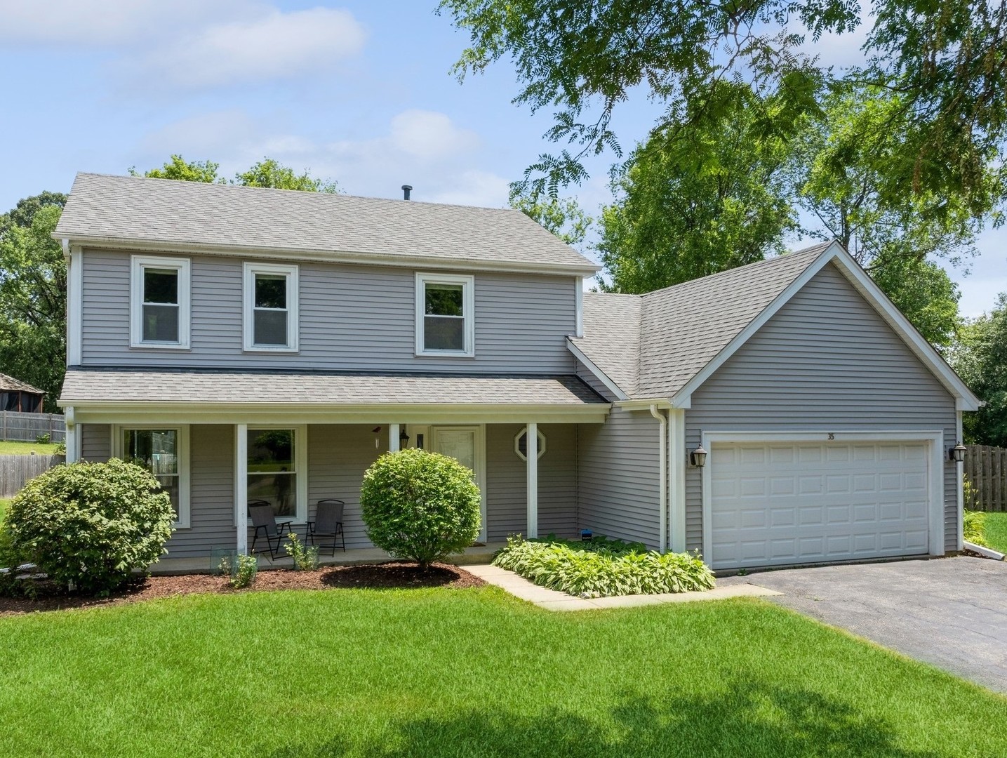 35 Crompton Court Fox River Grove, IL 60021 - Photo 1 of 39 front view of a house with a yard
