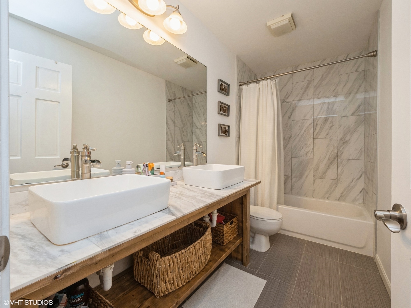 35 Crompton Court Fox River Grove, IL 60021 - Photo 19 of 39 a bathroom with a double vanity sink mirror and toilet