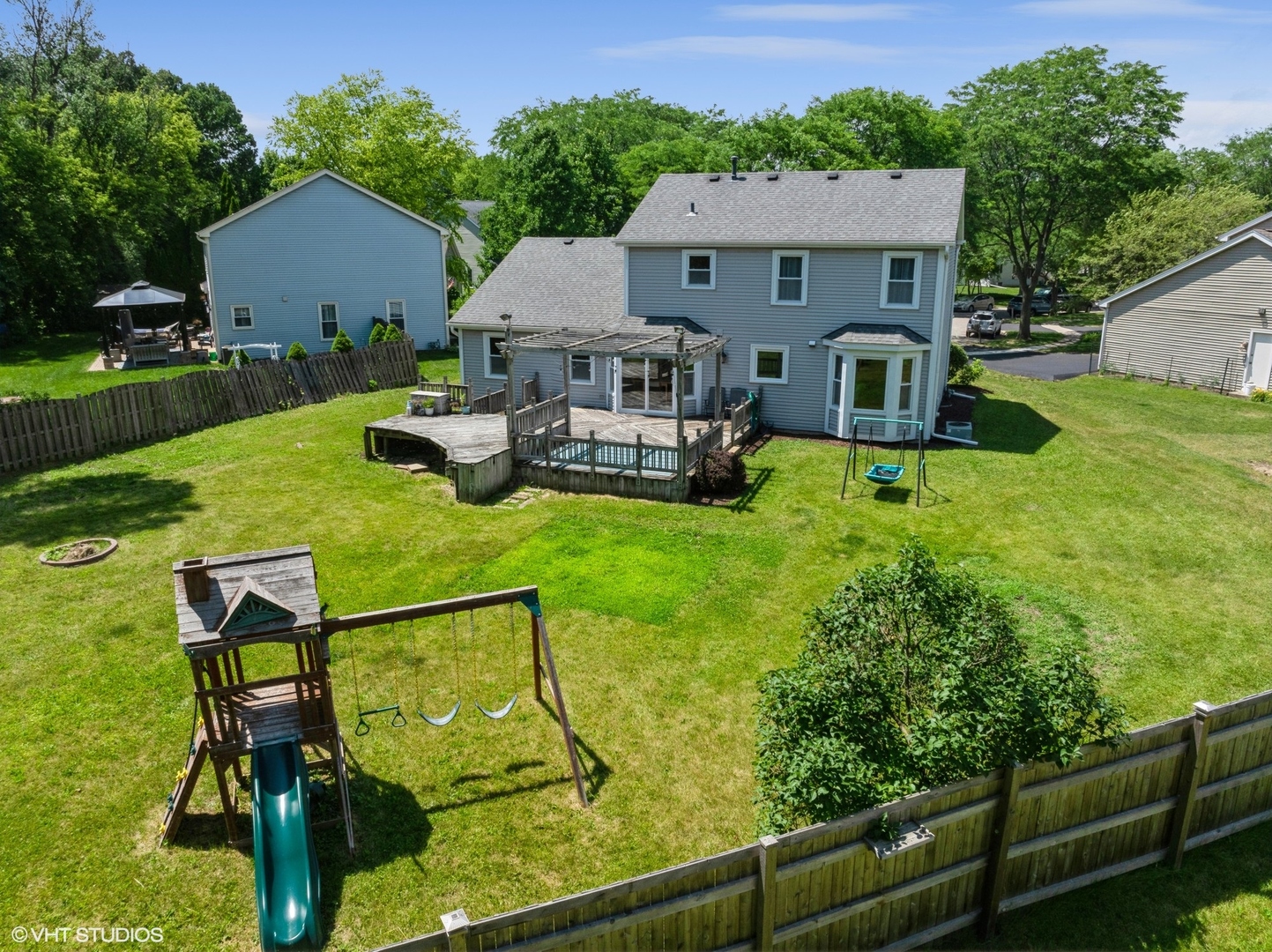 35 Crompton Court Fox River Grove, IL 60021 - Photo 29 of 39 a view of a house with backyard sitting area and garden