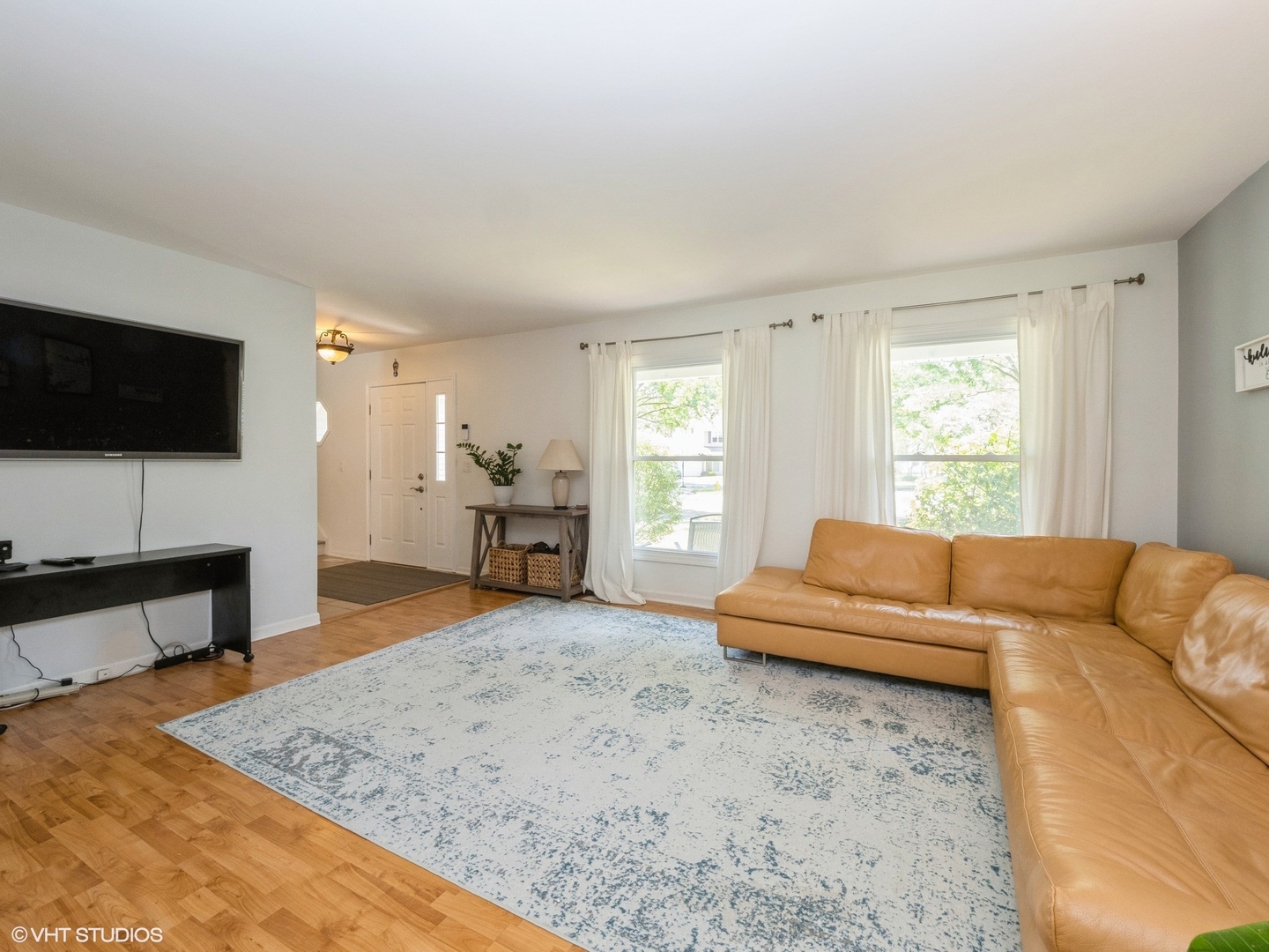 35 Crompton Court Fox River Grove, IL 60021 - Photo 3 of 39 a living room with furniture and a flat screen tv