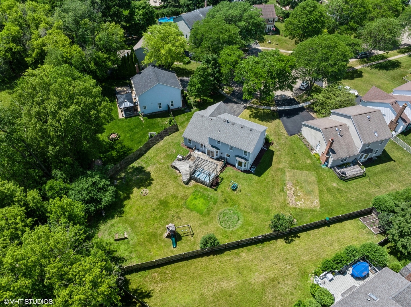 35 Crompton Court Fox River Grove, IL 60021 - Photo 31 of 39 an aerial view of a house with a garden and swimming pool