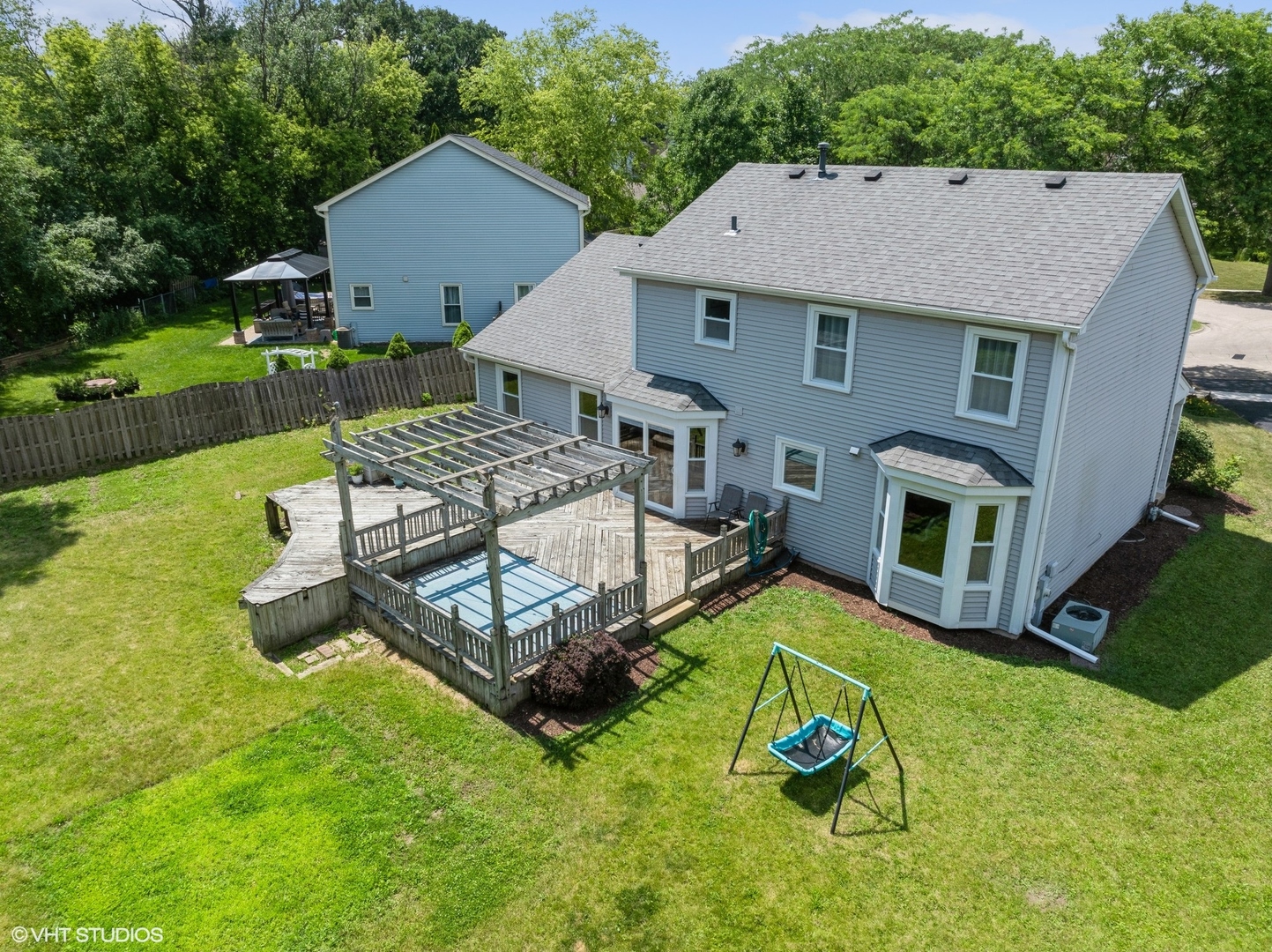 35 Crompton Court Fox River Grove, IL 60021 - Photo 33 of 39 a aerial view of a house with swimming pool yard and outdoor seating