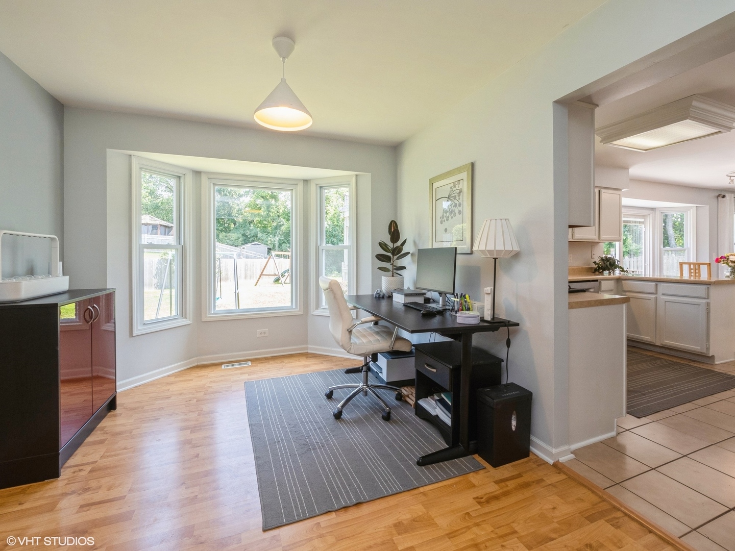 35 Crompton Court Fox River Grove, IL 60021 - Photo 4 of 39 a view of a workspace with furniture and a window