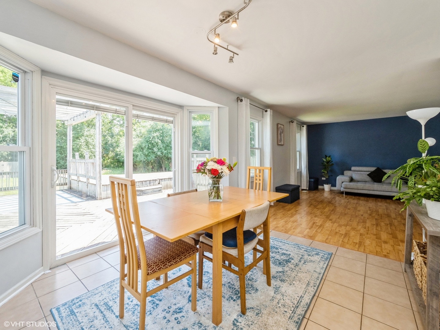 35 Crompton Court Fox River Grove, IL 60021 - Photo 8 of 39 a dining room with furniture potted plants and wooden floor