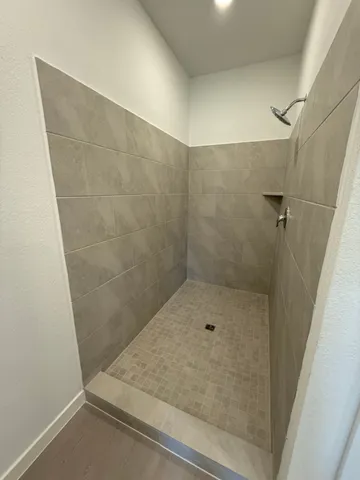 a view of an empty walk in closet