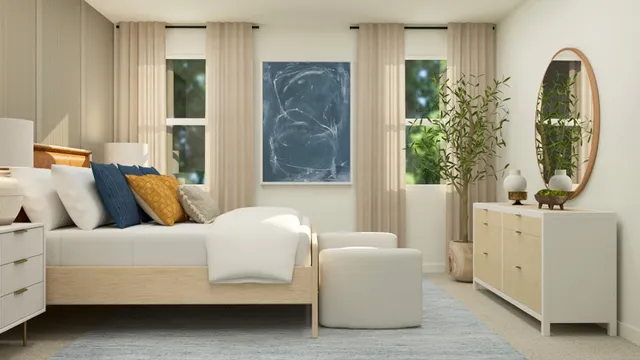 a bathroom with a sink a mirror and a potted plant