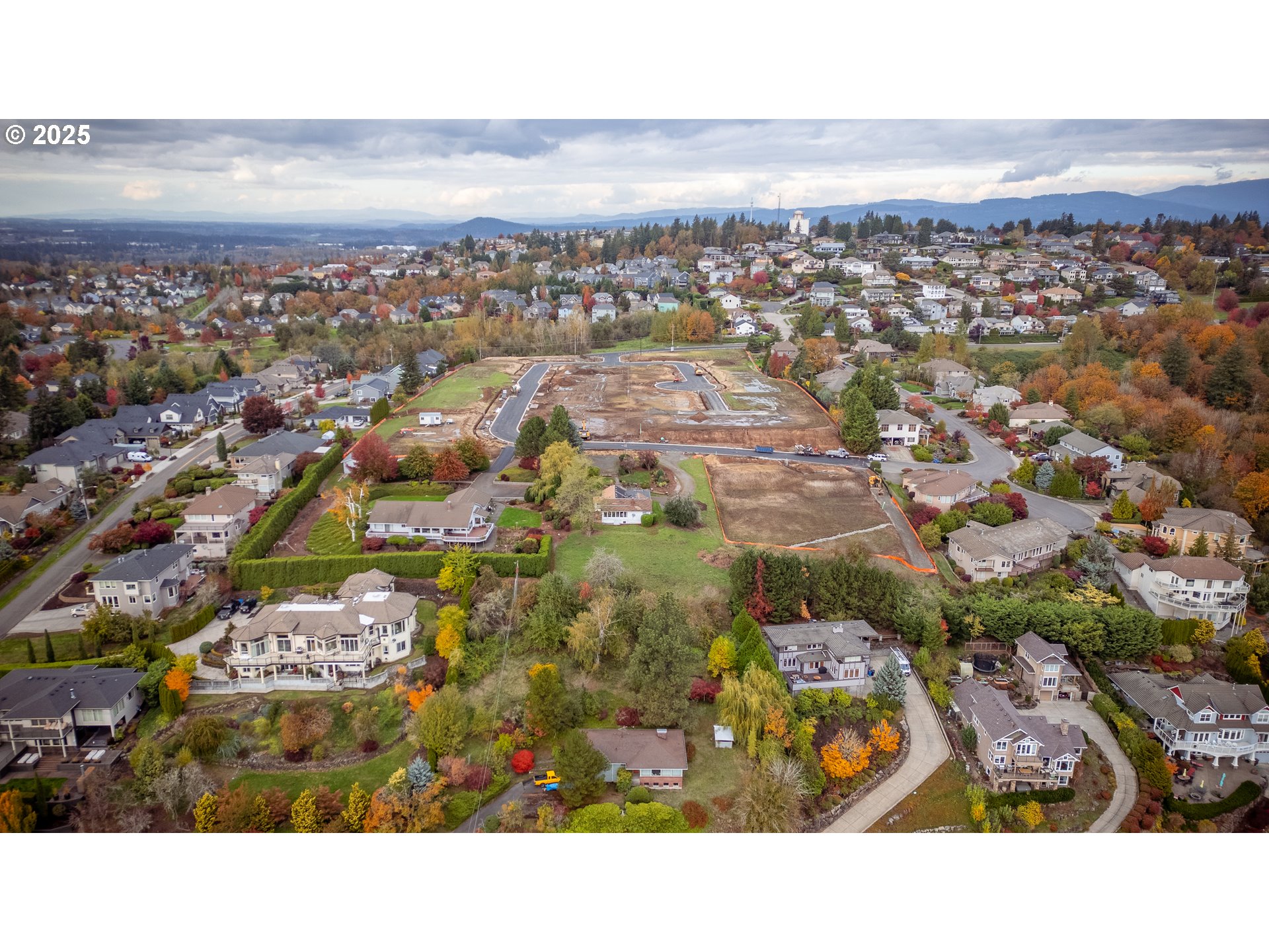 703 Northwest Gdn Court, Unit LOT 19 Camas, WA 98607 - Photo 9 of 13 an aerial view of residential building and ocean view