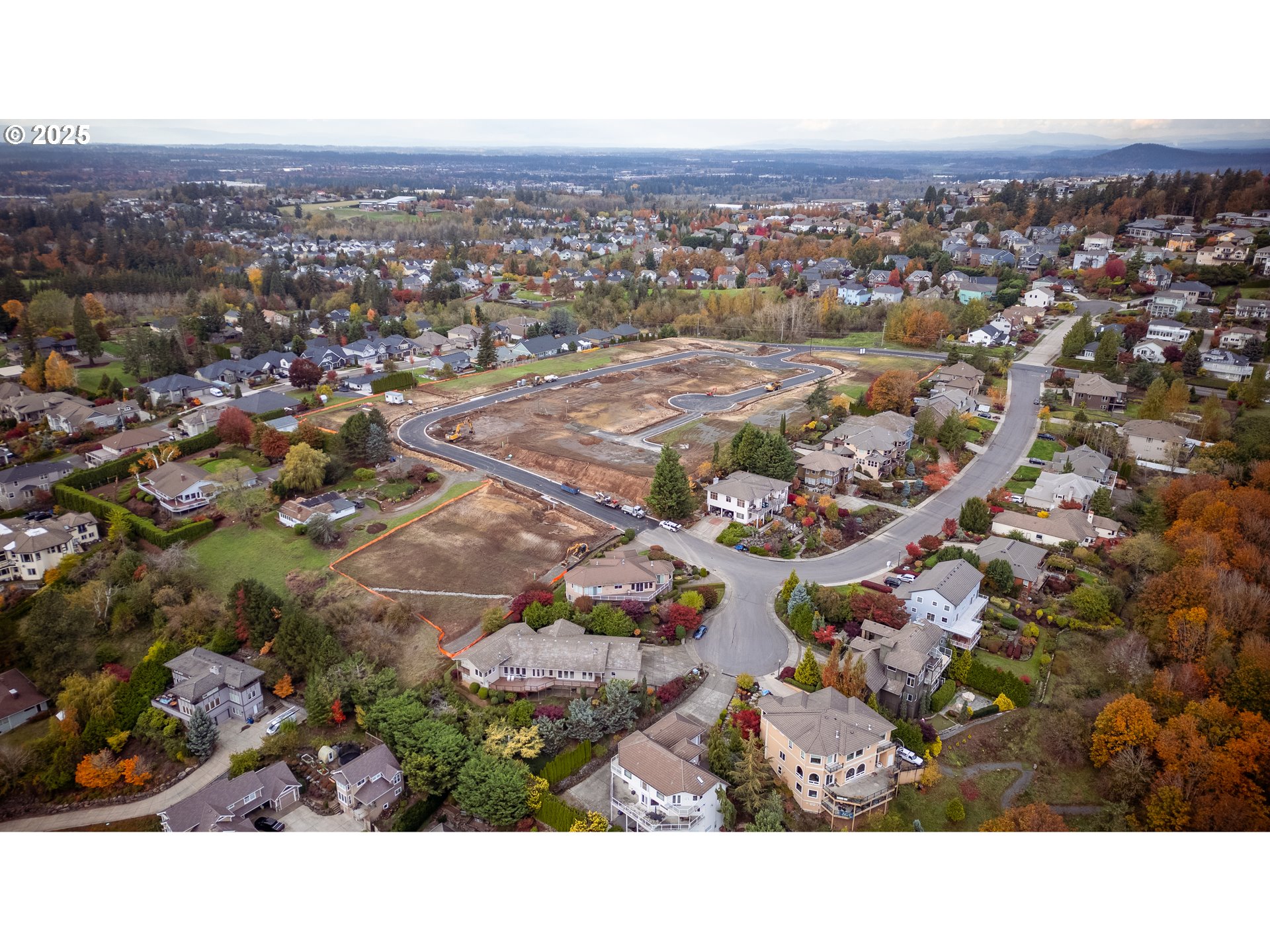 703 Northwest Gdn Court, Unit LOT 19 Camas, WA 98607 - Photo 10 of 13 an aerial view of residential houses with city view