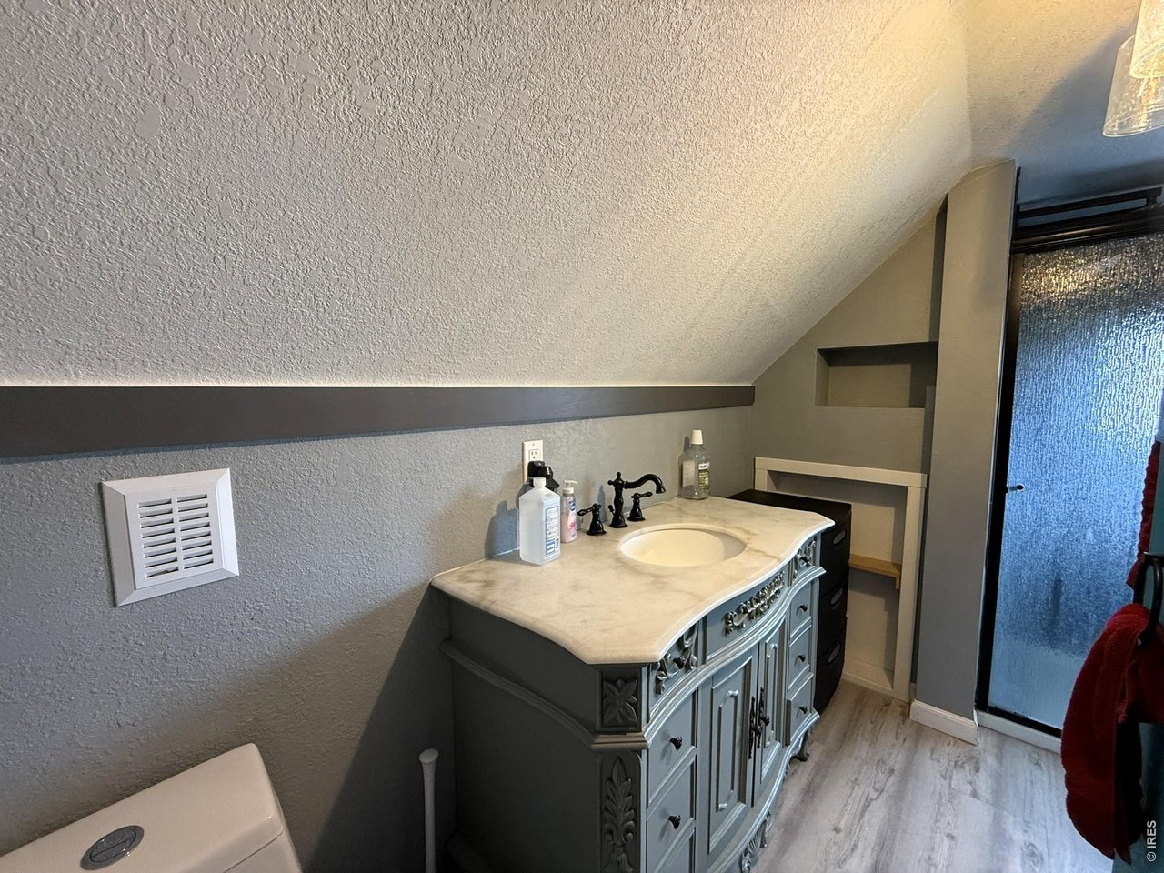 1935 County Road 75 Fleming, CO 80728 - Photo 22 of 31 a bathroom with a sink and a toilet