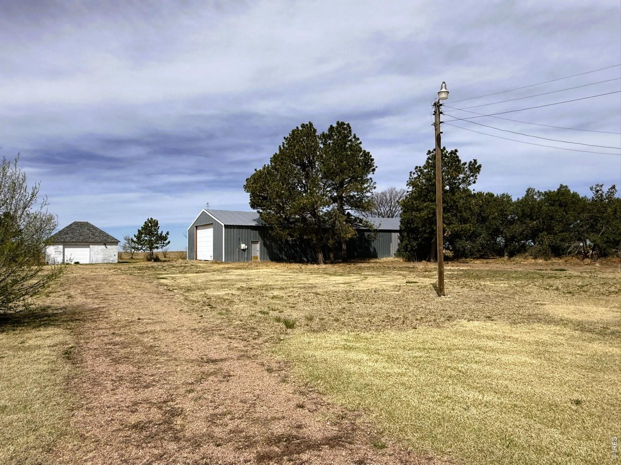 1935 County Road 75 Fleming, CO 80728 - Photo 25 of 31 a view of a house with a yard