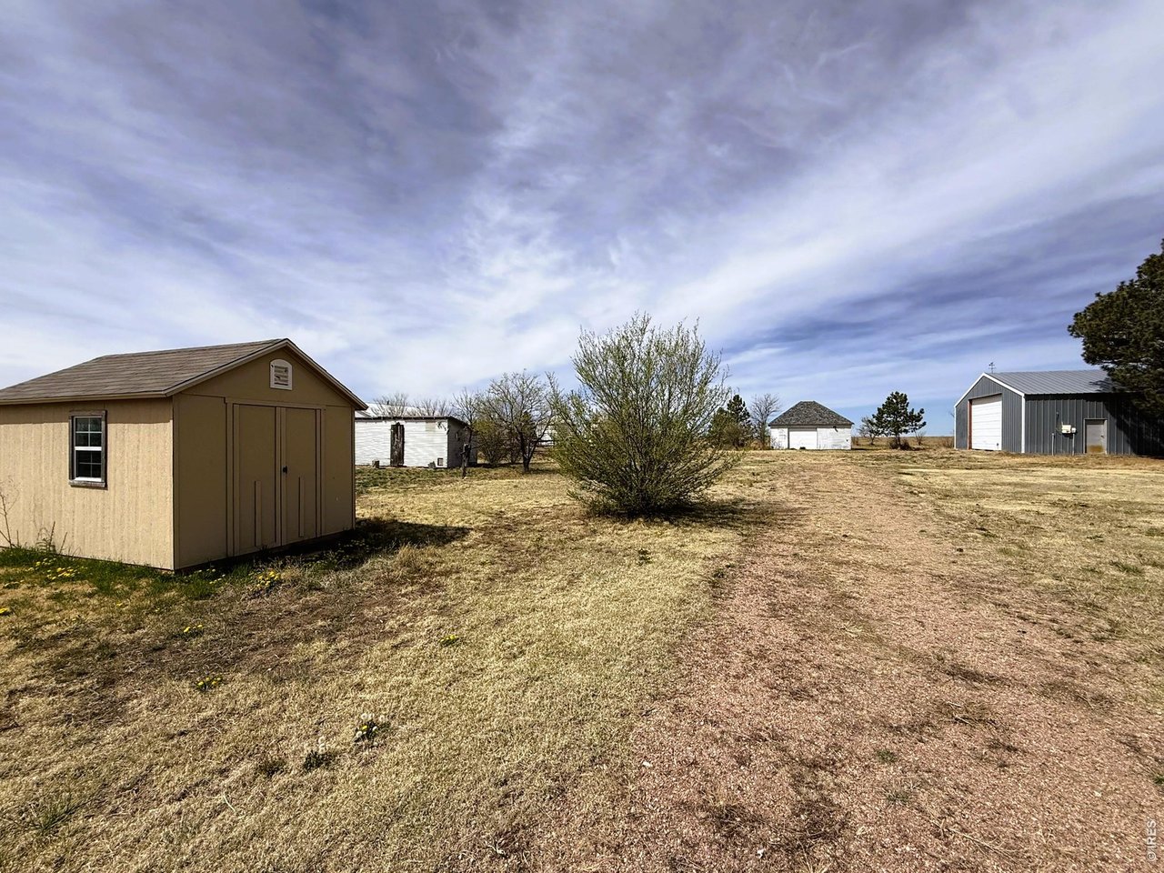 1935 County Road 75 Fleming, CO 80728 - Photo 26 of 31 a view of a house with a yard