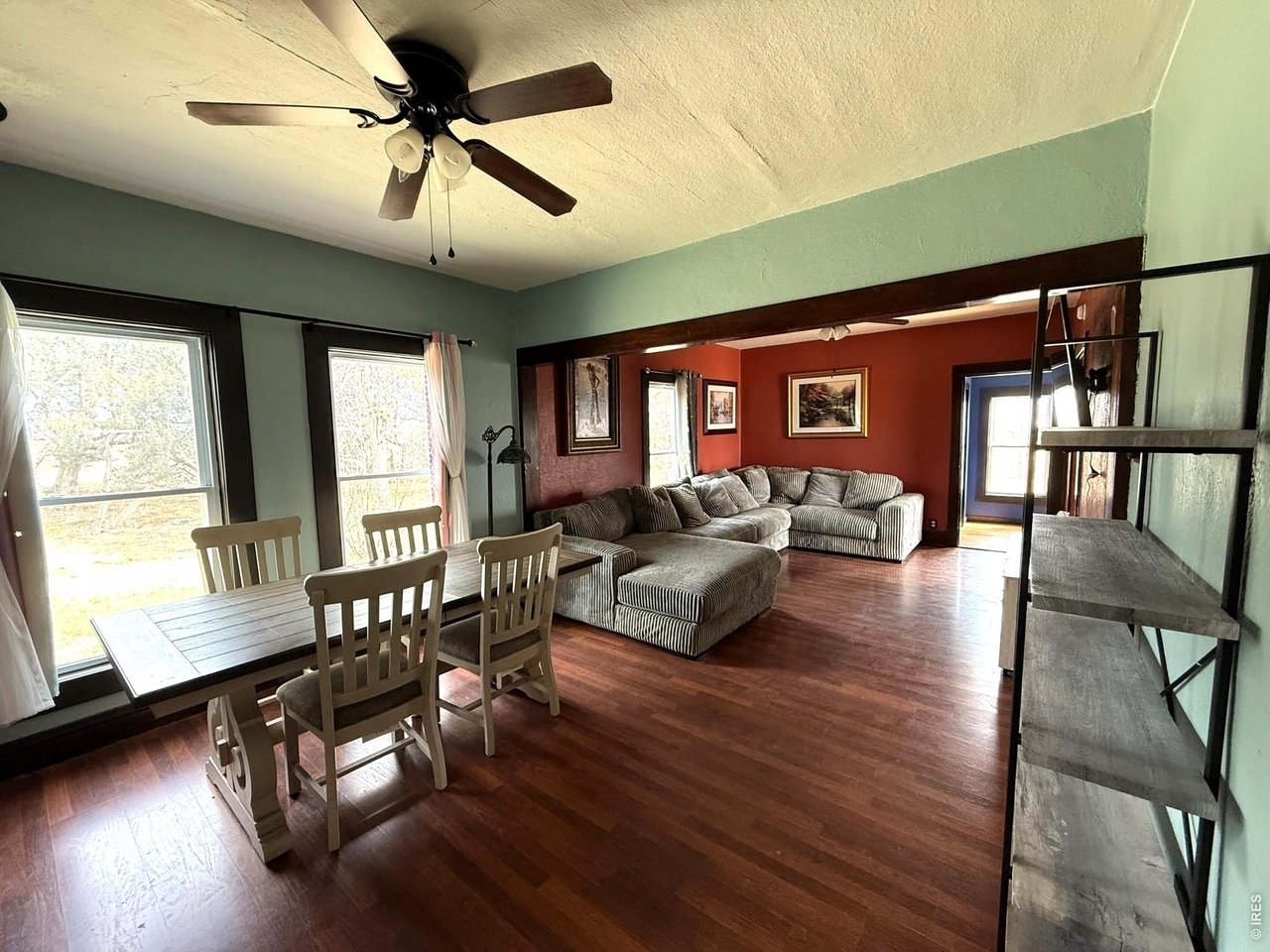 1935 County Road 75 Fleming, CO 80728 - Photo 9 of 31 a living room with furniture window and wooden floor
