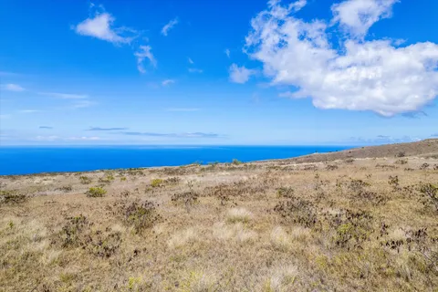 a view of ocean beach with ocean view