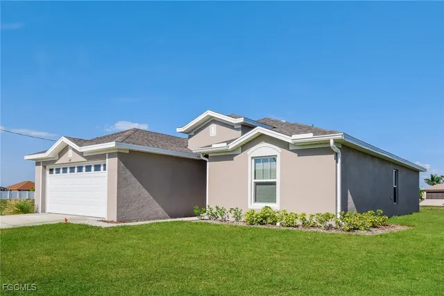 a front view of house with yard