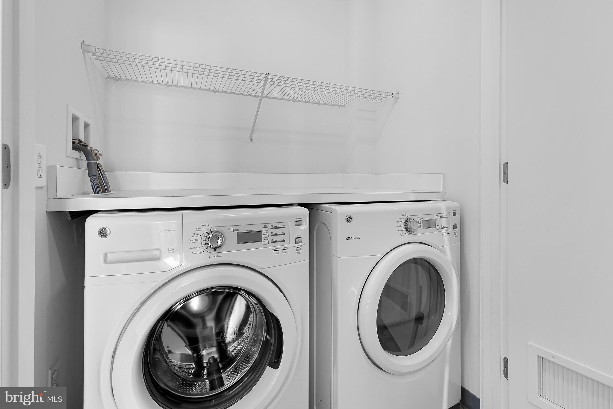 880 New Jersey Avenue Southeast, Unit STUDIO Washington, DC 20003 - Photo 12 of 24 a utility room with dryer and washer