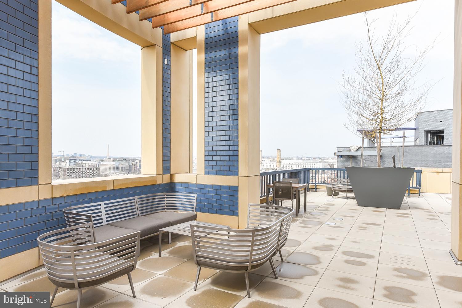 880 New Jersey Avenue Southeast, Unit STUDIO Washington, DC 20003 - Photo 19 of 24 a outdoor space with patio the couches and a dining table with garden view